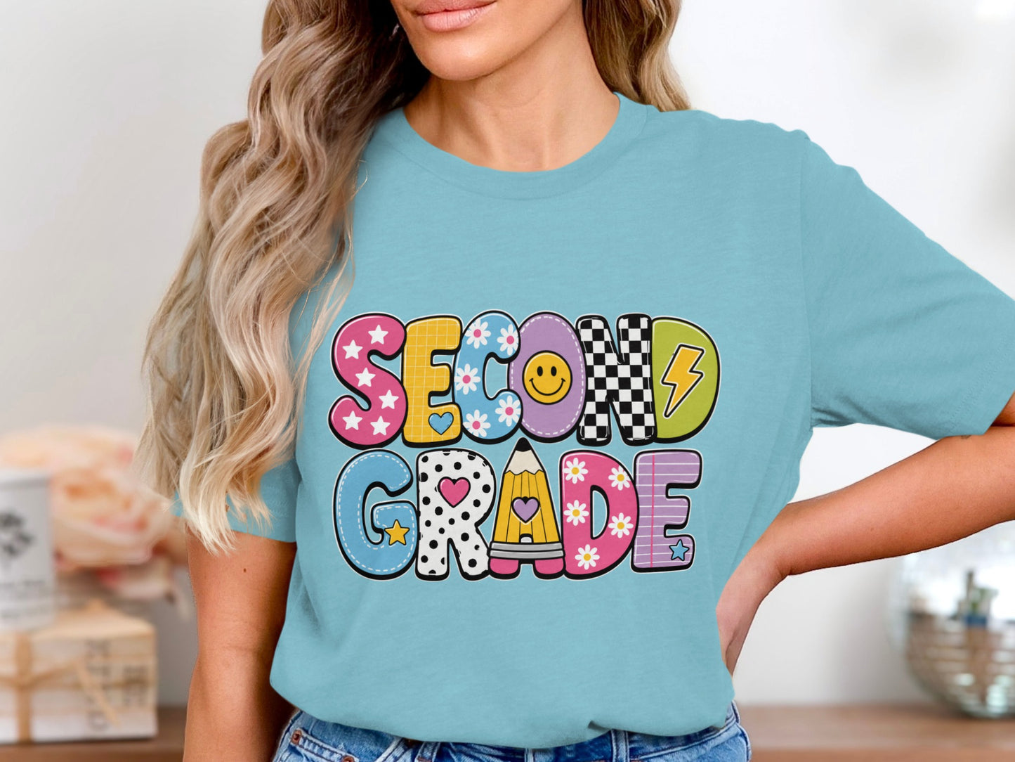 Aqua shirt with "SECOND GRADE" in colorful, patterned letters