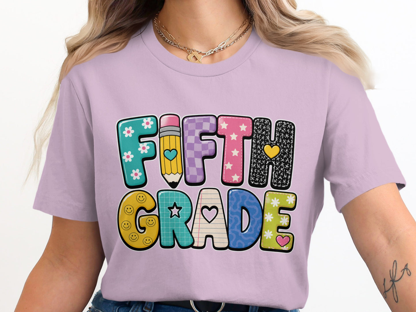 "FIFTH GRADE" text in colorful bubble letters on a lilac t-shirt.