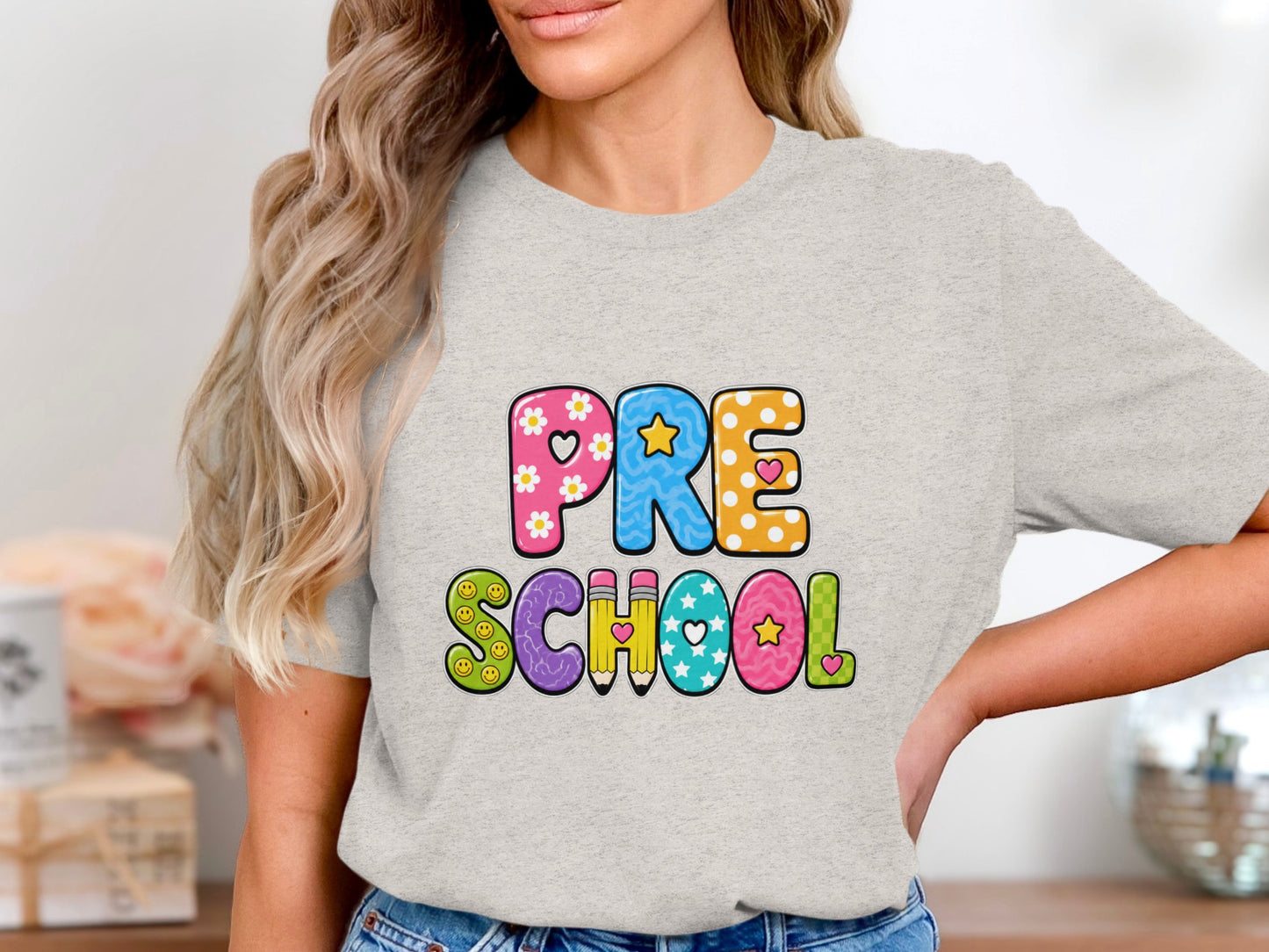 Text reads PRE SCHOOL in colorful, patterned letters with playful icons.