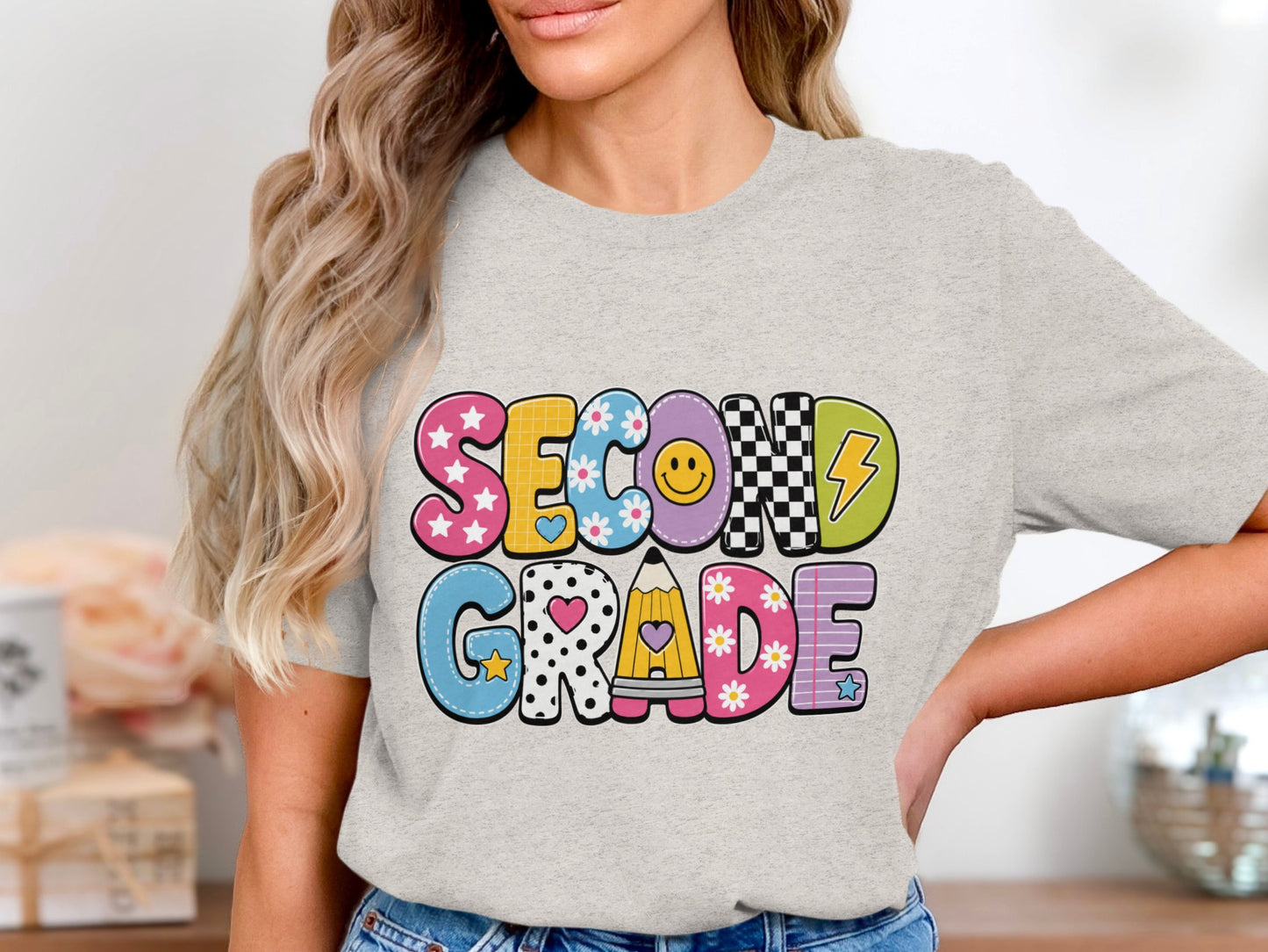 Second Grade graphic t-shirt with colorful, patterned letters.