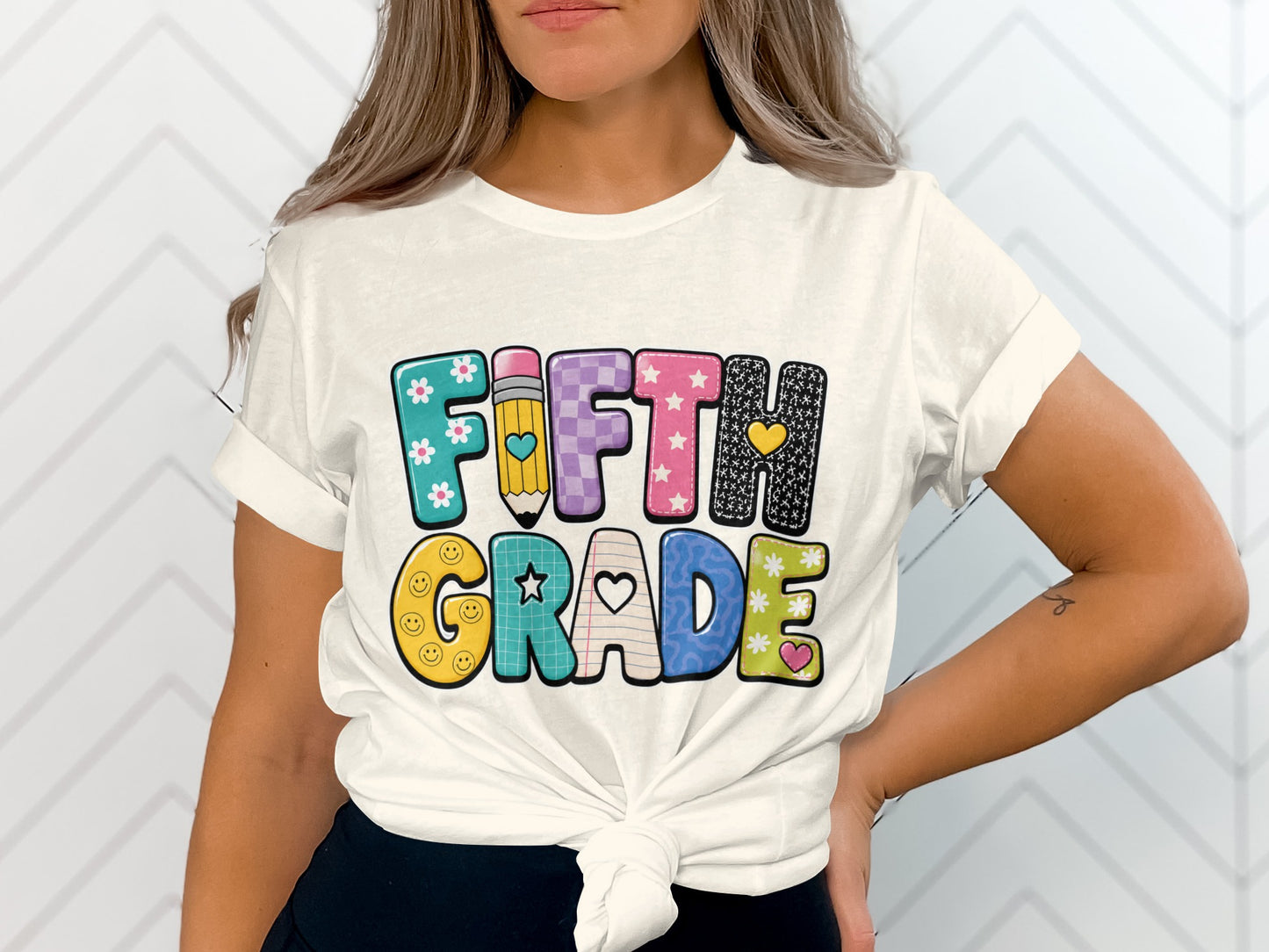 Fifth Grade text with colorful letter designs including smiley faces and flowers.