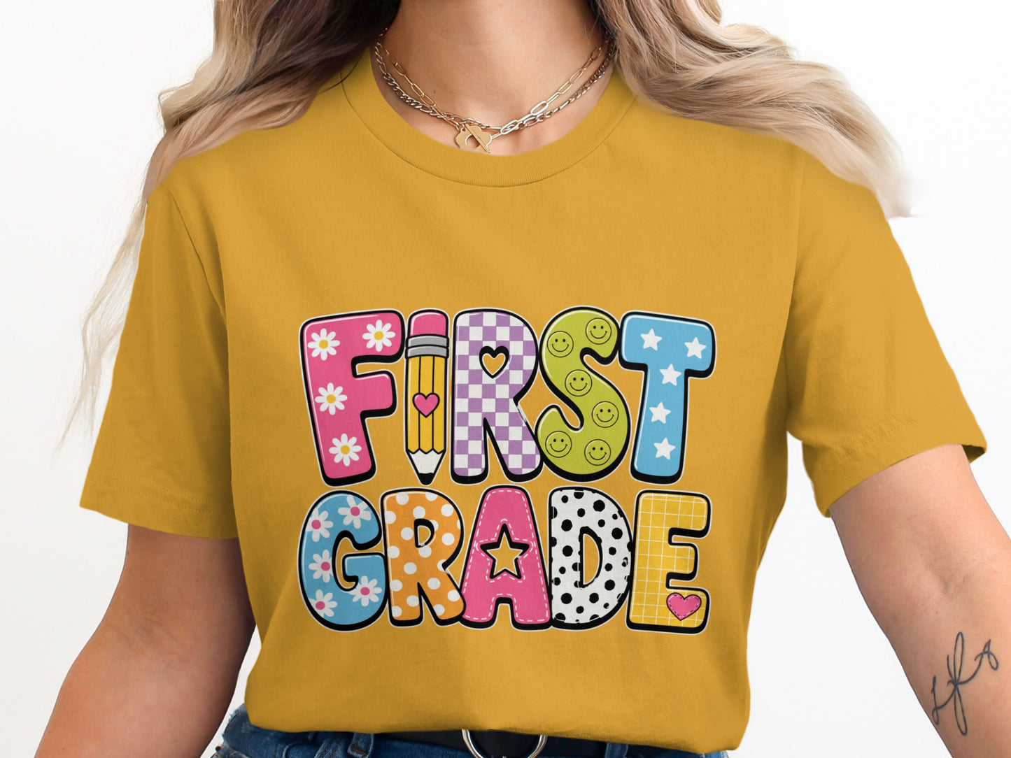 First Grade text with colorful letters, flowers, pencil, smiley faces, and stars.