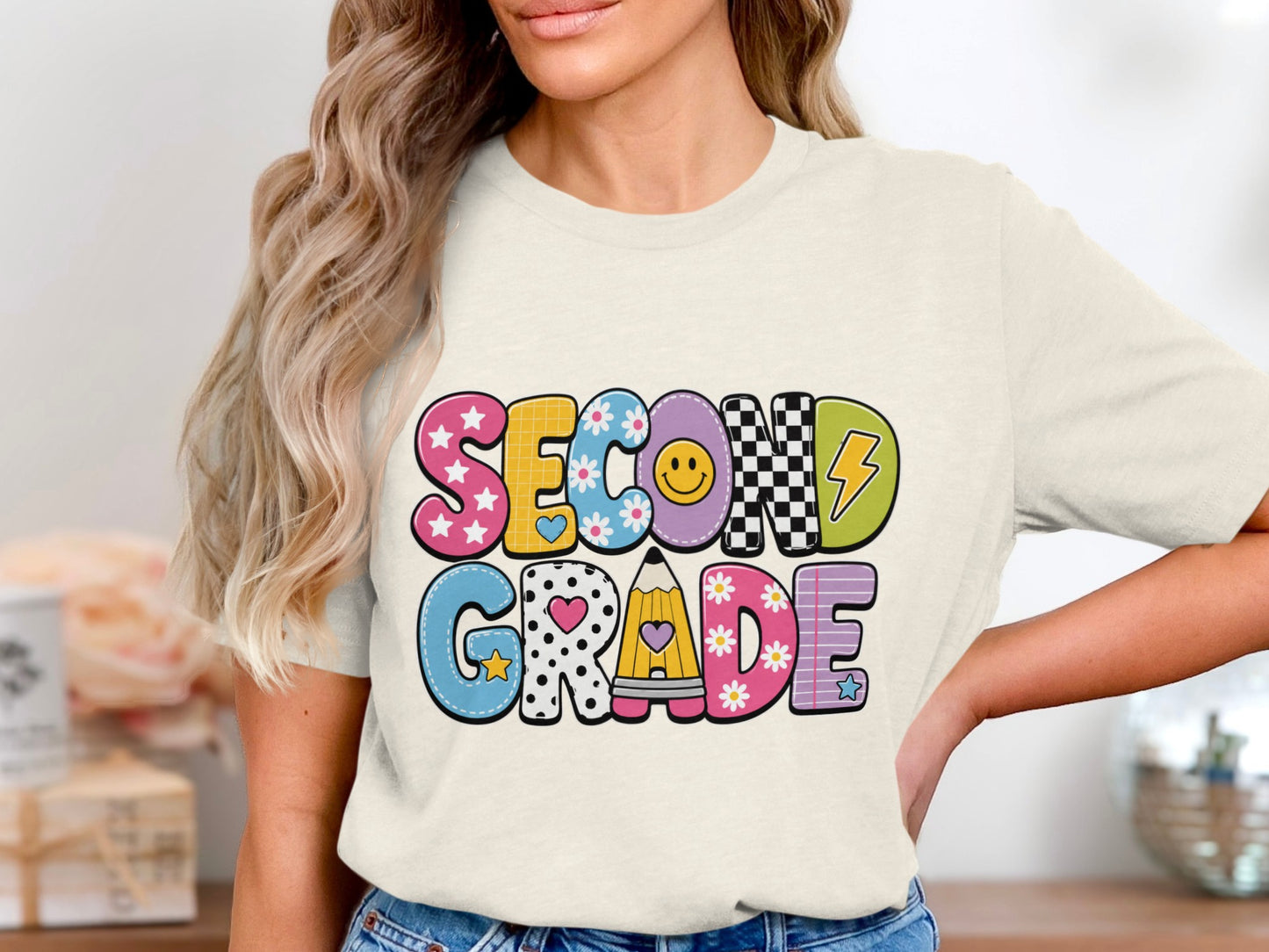 Shirt with "Second Grade" text in colorful, patterned block letters.